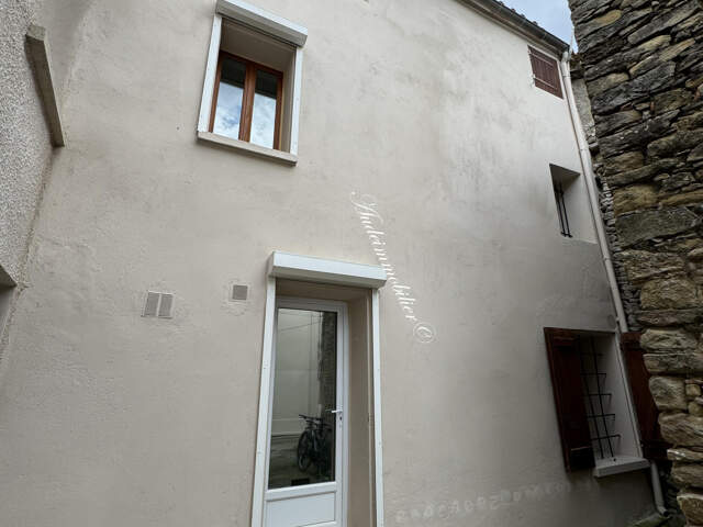 Maison de village avec garage — photo du bien