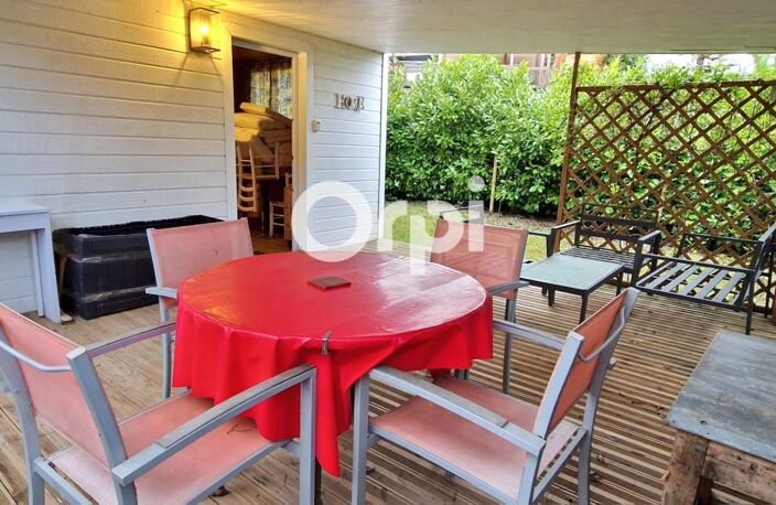 Terrain de loisir de 115m² avec chalet en bois et terrasse — photo 2