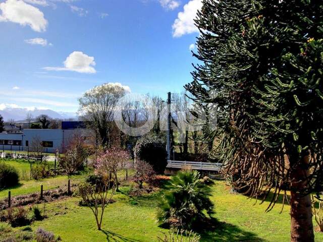 Charmante maison familiale avec jardin paysager, à 10 minutes de Pau — photo du bien
