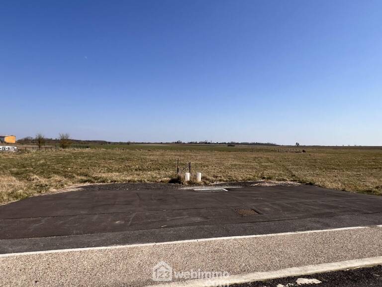 Terrain à bâtir - 1096m² - MORGEMOULIN — photo 1