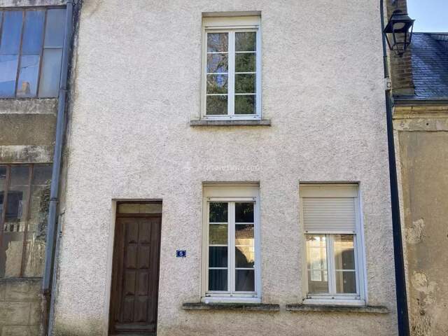 Maison de village avec sous-sol et jardin à proximité — photo du bien