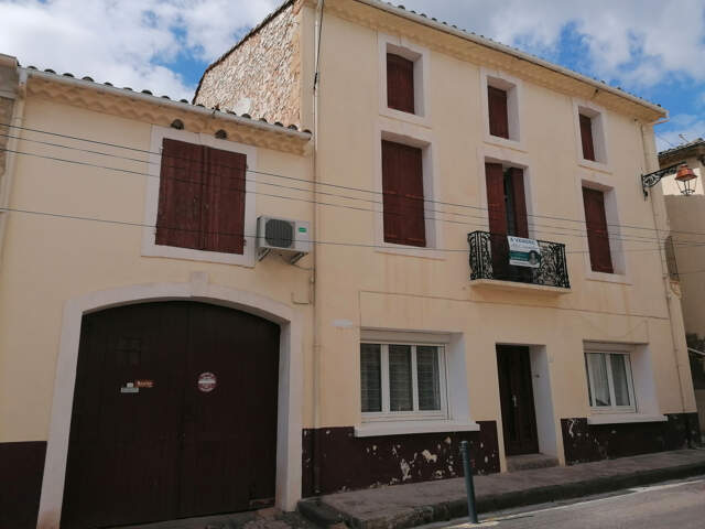 POMEROLS : Maison à rénover avec grand garage et jardin san — photo du bien