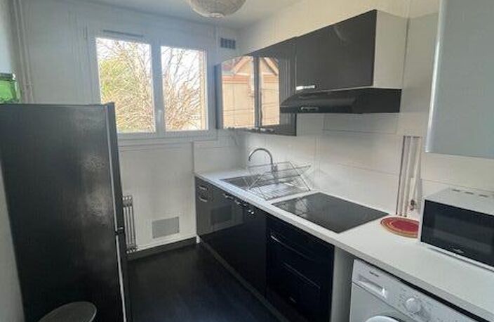 INVESTISSEMENT APPARTEMENT 2 CHAMBRES BALCON ET GARAGE AVEC LOCATAIRE EN PLACE — photo 3