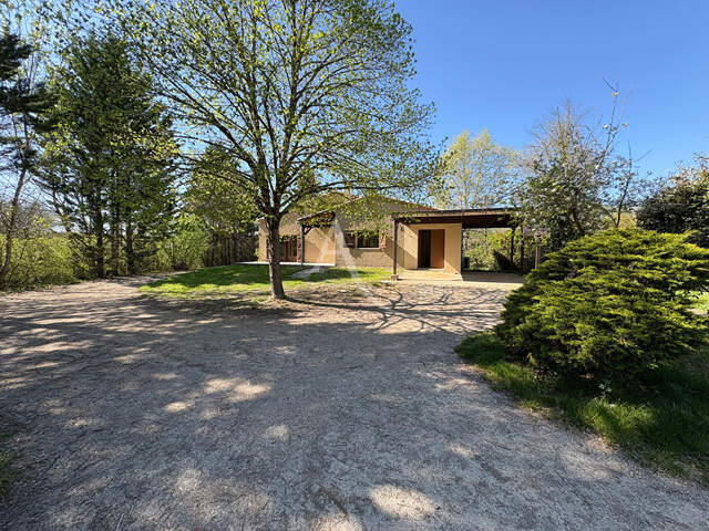 Maison 5 chambres et terrain à Négrepelisse, secteur boisé et verdoyant — photo du bien