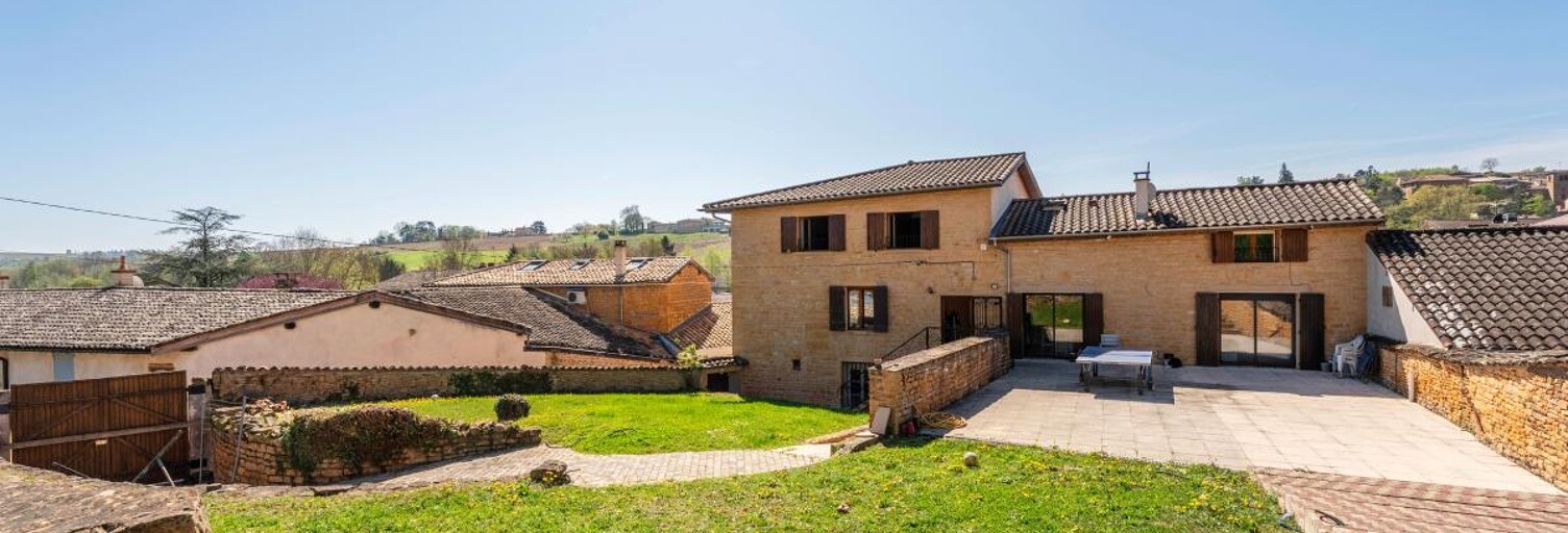 Maison 5 Pièces 186 m² à vendre à Porte des Pierres Dorées (69400)