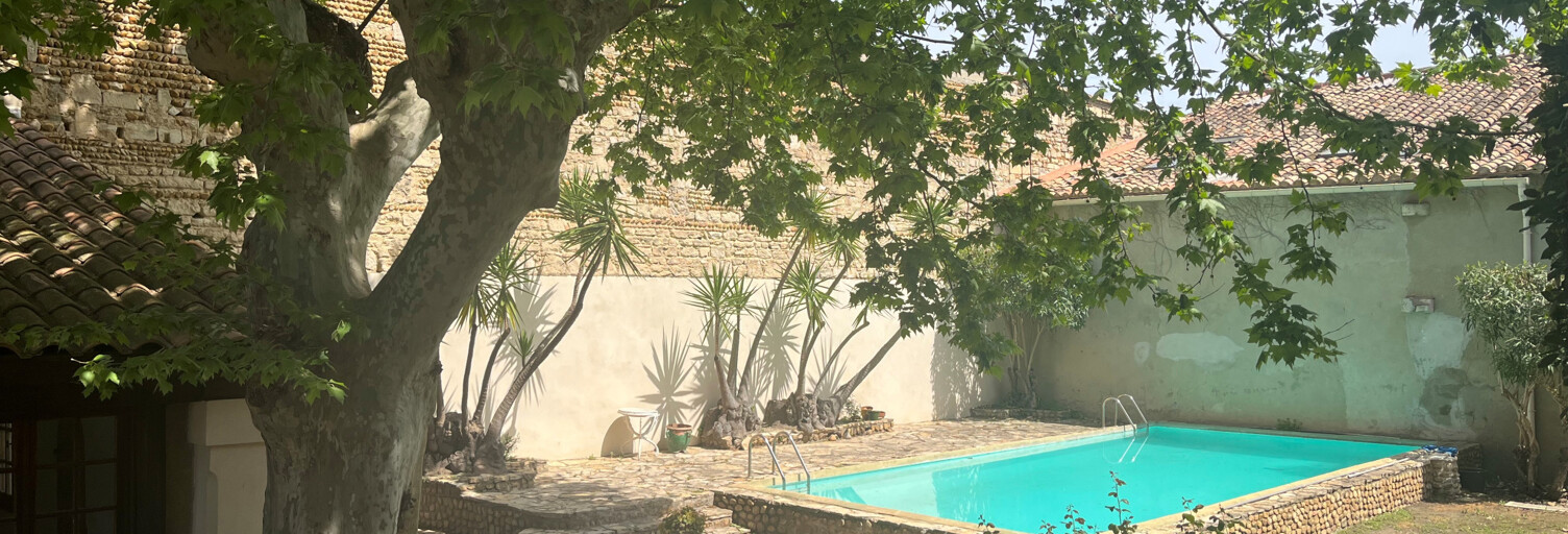 Maison 7 Pièces 185 m² à vendre à Saint-Gilles (30800)