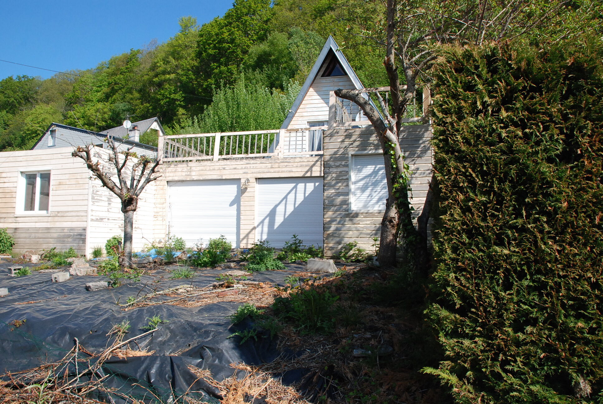 Colleville, terrain à bâtir avec chalet