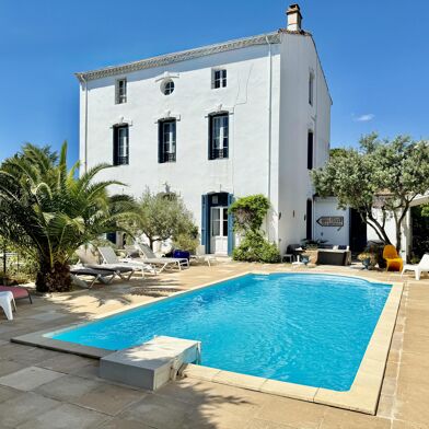 Maison 10 pièces 499000 €