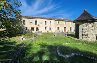 OPPORTUNITÉ - VIAGER OCCUPE, maison en pierre de 196 m2 et dépendances sur jardin — photo du bien
