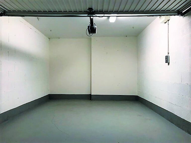 Garage en sous-sol au centre-ville — photo 1