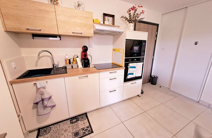 VENDU - Centre ville Appartement type 2 de 43m² avec garage fermé privatif et grande Terrasse — photo 5