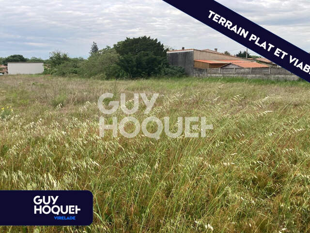 Terrain plat et viabilisé — photo du bien