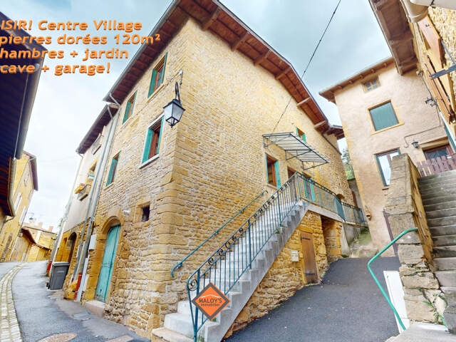 Maison en pierres dorées proche de toutes les commodités au calme  avec son jardinet, ses caves et garage. — photo du bien