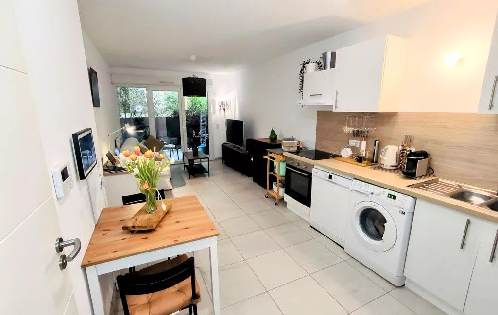 Photo Appartement Type 2 en RDC avec terrasse et place de parking image 2/4