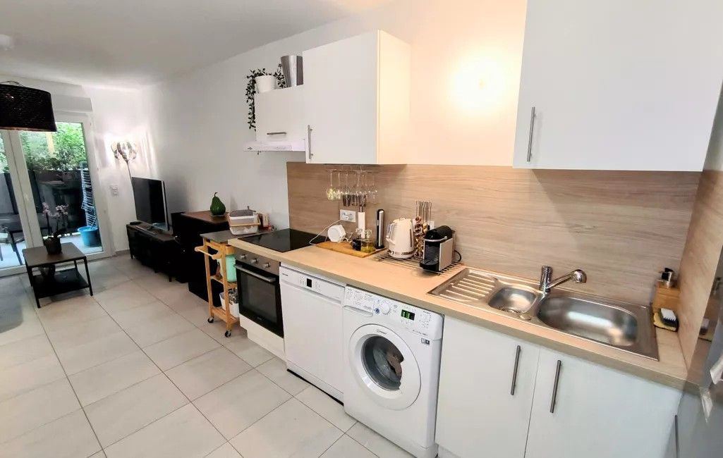 Photo Appartement Type 2 en RDC avec terrasse et place de parking image 4/4