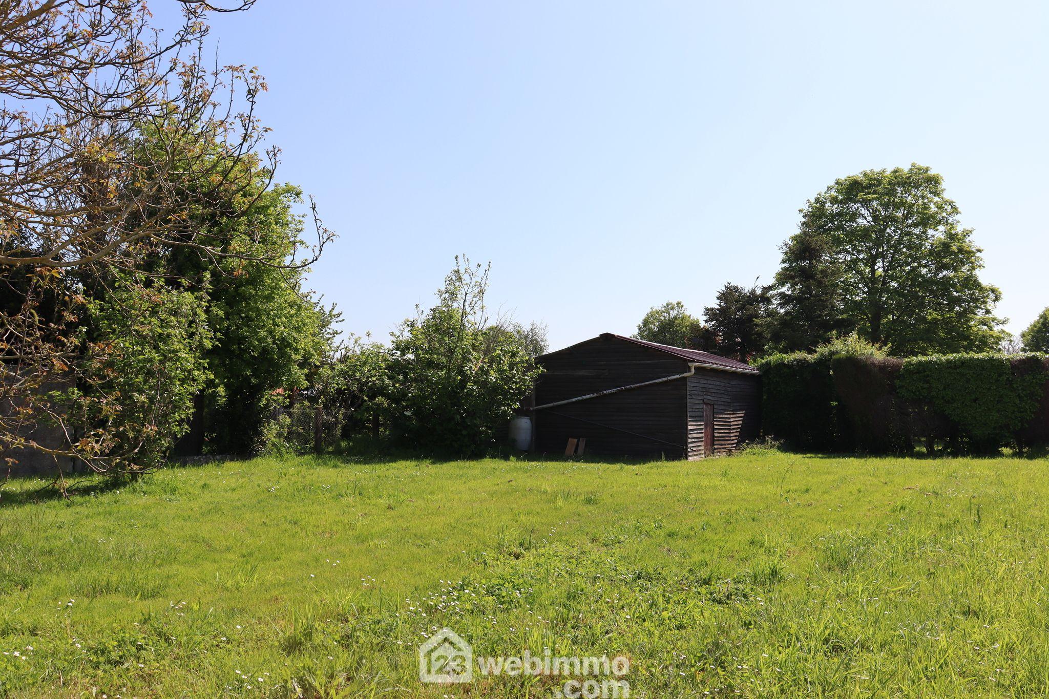 Photo Terrain à bâtir - 1200m² - Saint-Hilaire-la-Forêt image 3/4