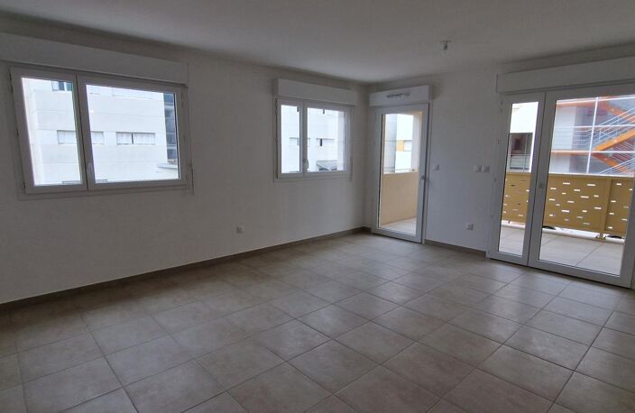 APPARTEMENT T3 DE 65 M² AVEC TERRASSE ET PARKING — photo 2