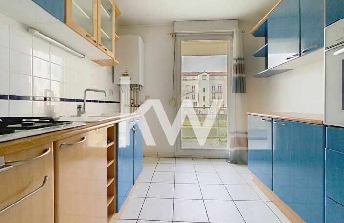 A VENDRE : APPARTEMENT PROCHE CENTRE-VILLE AVEC GARAGE DOUBLE — photo 4