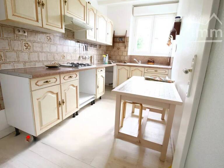 A vendre une bâtisse avec 2 logements avec un terrain non attena — photo 1
