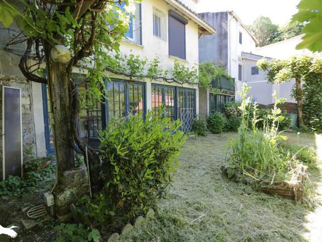Maison en pierre de 6 pièces principales — photo du bien