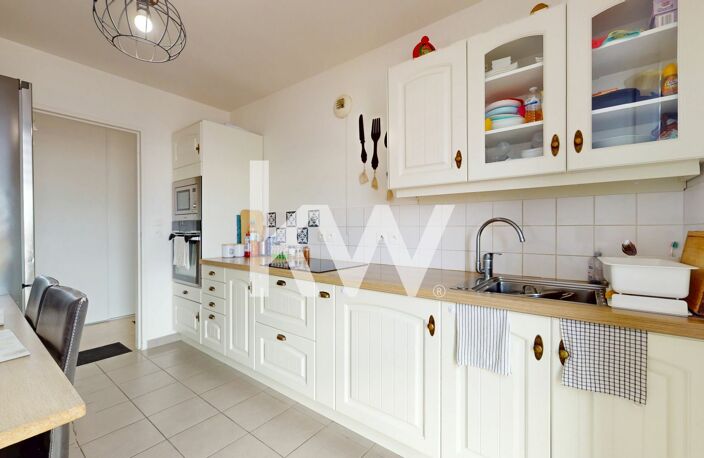 A VENDRE / APPARTEMENT AVEC TERRASSE ET GARAGE BOX -REIMS — photo 2