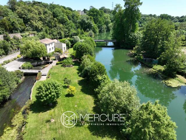 PROPRIETE BORDEE PAR LA RIVIERE — photo du bien