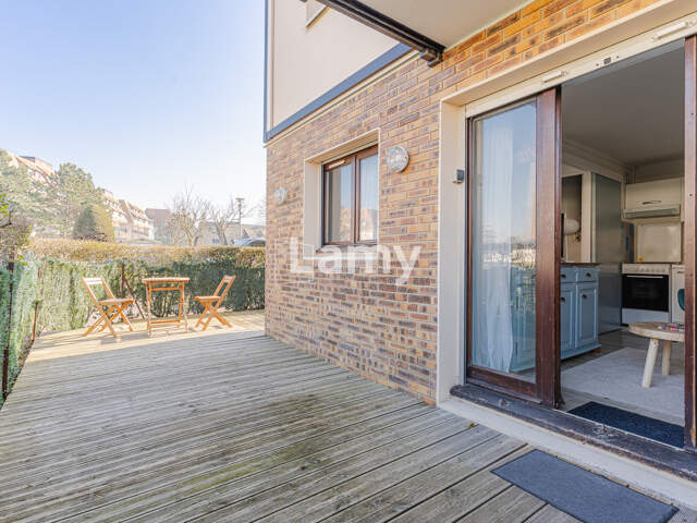 Appartement RDJ, parking — photo du bien