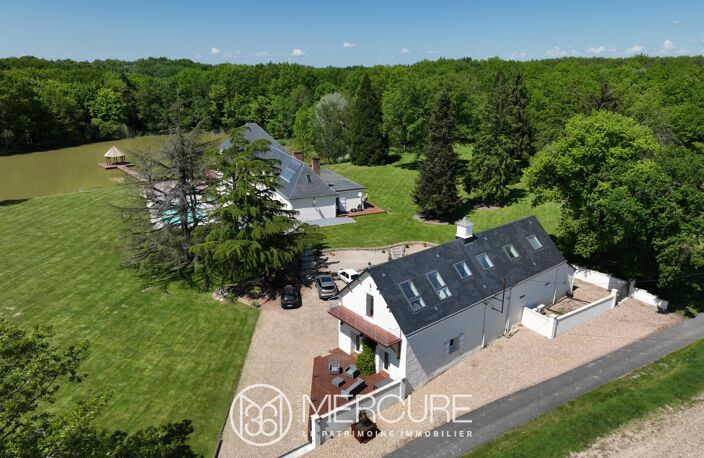 PROPRIETE AVEC ETANG ET MAISONS ANNEXES — photo 2