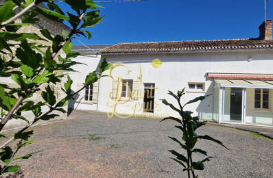 MAISON DE VILLAGE DE 123 M2 DE PLAIN-PIED AVEC DEPENDANCES E — photo du bien