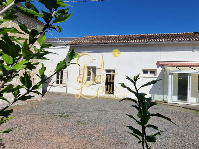 MAISON DE VILLAGE DE 123 M2 DE PLAIN-PIED AVEC DEPENDANCES E — photo du bien