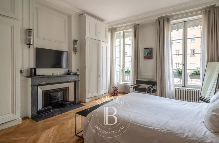 Lyon 2 – Appartement traversant 129,76 m² - 3 chambres - Grenier - Cave — photo 4
