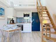 DUPLEX DERNIER ÉTAGE AU PIED DES PLAGES À VENDRE RÉNOVÉ À LA LON — photo 2