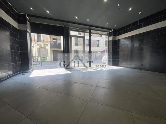 Local commercial 50 m² + cave — photo du bien