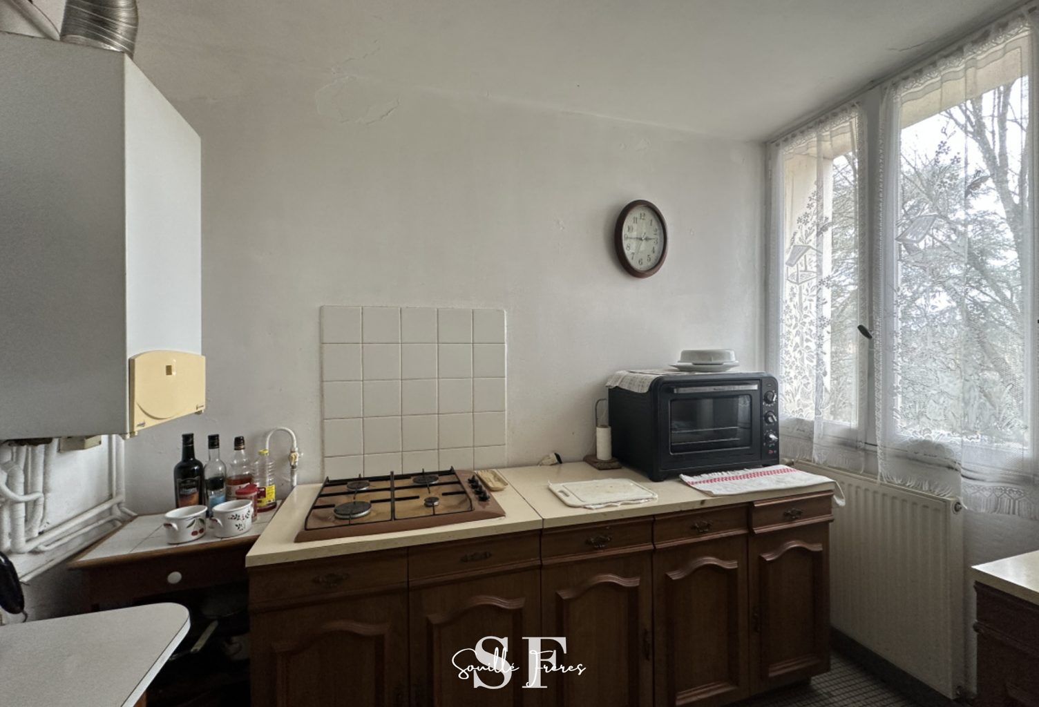 AGEN - APPARTEMENT F4 AVEC BALCONS ET CAVE — photo 1