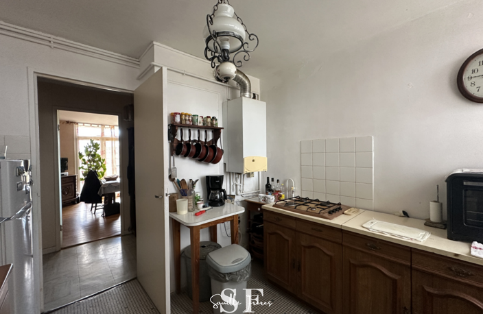 AGEN - APPARTEMENT F4 AVEC BALCONS ET CAVE — photo 5