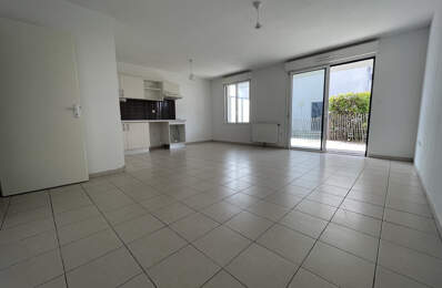 Appartement T3 de 66 m2 en rez-de-chaussée avec terrasse   Q — photo du bien