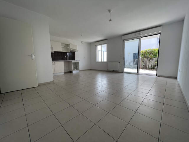 Appartement T3 de 66 m2 en rez-de-chaussée avec terrasse   Q — photo du bien