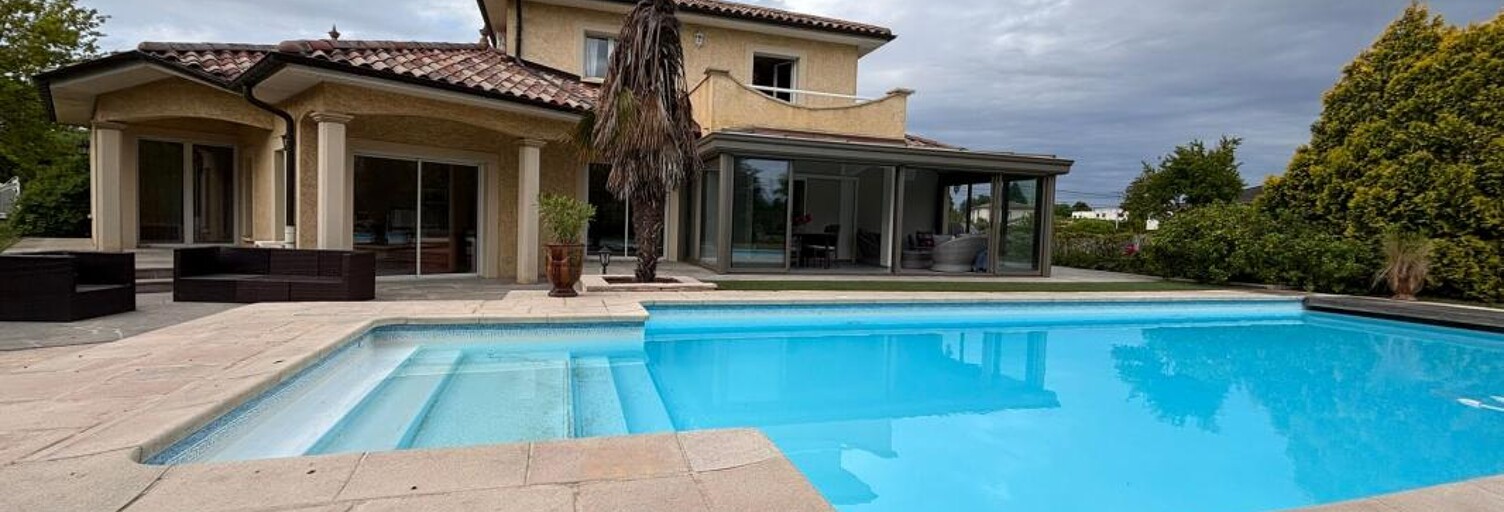 Maison 7 Pièces 206 m² à vendre à Fontaines-Saint-Martin (69270)