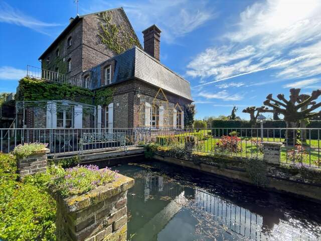 Propriété de prestige : ancien moulin de charme au cœur d’un écrin de verdure à 1h de Paris — photo du bien