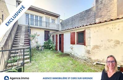 Maison avec un local pro loué et garages — photo du bien