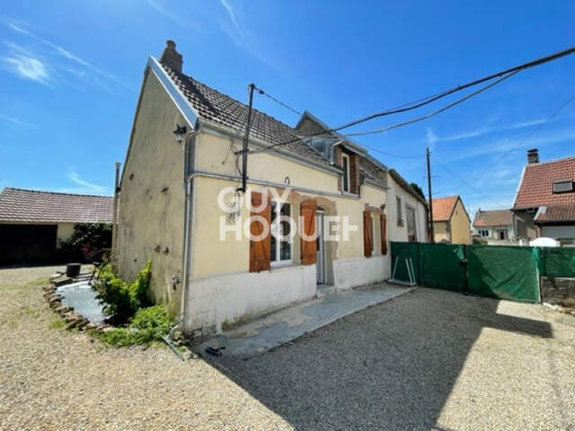 maison — photo du bien