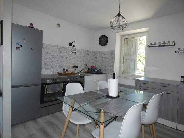 Appartement T3 avec balcon, cave et grenier — photo du bien