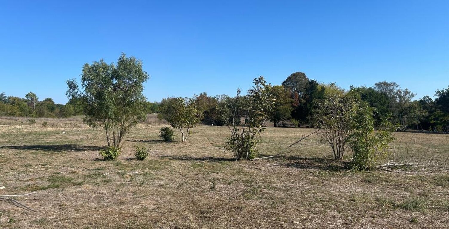 Pont L'Abbé d'Arnoult, parcelle de terrain à bâtir bien exposée — photo 1