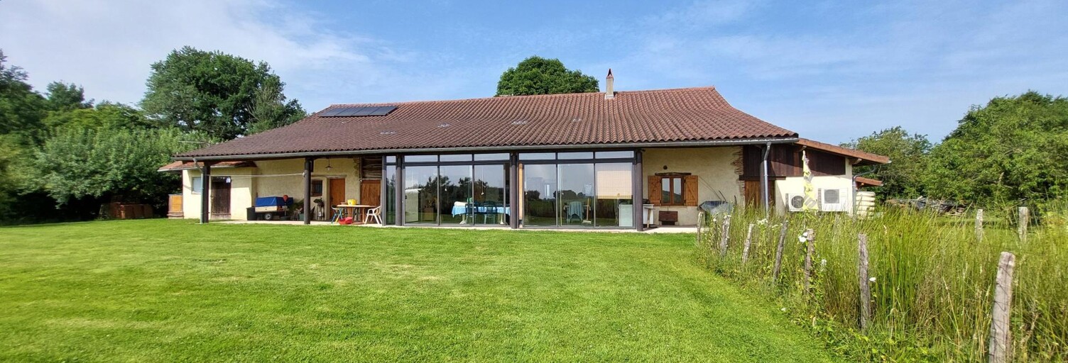 Maison 5 Pièces 163 m² à vendre à Saint-Trivier-de-Courtes (01560)