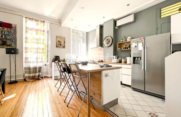 Appartement haussmannien de 155 m² avec jardin partagé, en plein centre de Valence. — photo 3