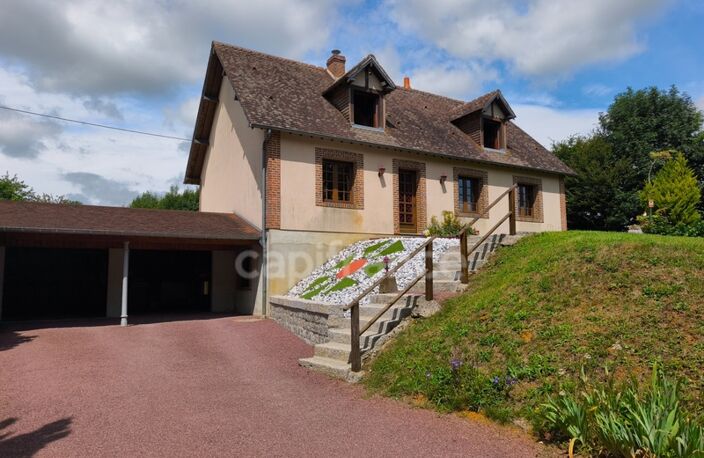 À Échauffour (61370), découvrez cette spacieuse maison familiale de 135 m², offrant 4 chambres, un vaste jardin paysagé de 7 490 m², une grande terrasse, au cœur d’un environnement calme et verdoyant — photo 2