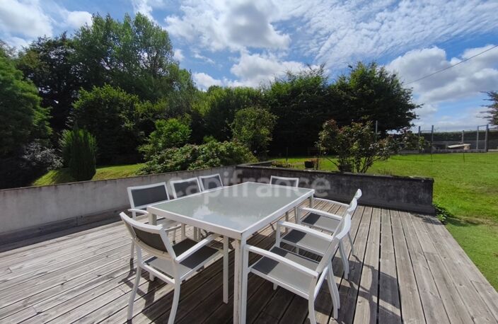 À Échauffour (61370), découvrez cette spacieuse maison familiale de 135 m², offrant 4 chambres, un vaste jardin paysagé de 7 490 m², une grande terrasse, au cœur d’un environnement calme et verdoyant — photo 3