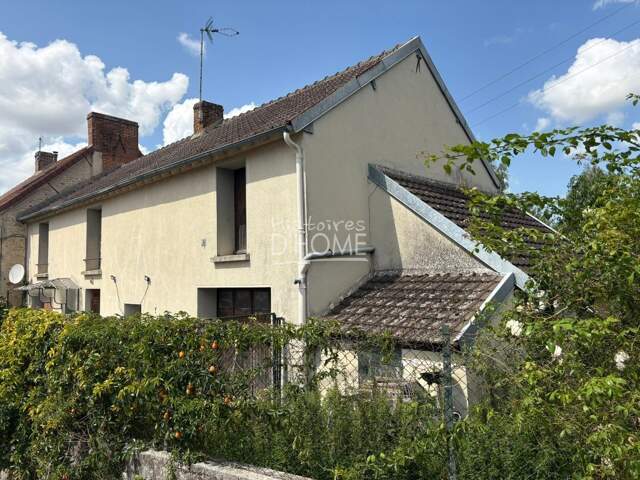 Maison 4 pièces - 358 m² de terrain - garage — photo du bien
