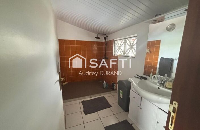 ENSEMBLE IMMOBILIER SITUE DANS LE SECTEUR RECHERCHE DU LAC BLEU — photo 4