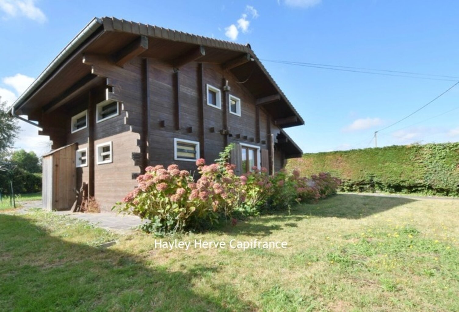 À vendre, à deux pas de la plage : chalet avec terrain, garages et beau potentiel Asnelles (14) (Calvados) — photo 1